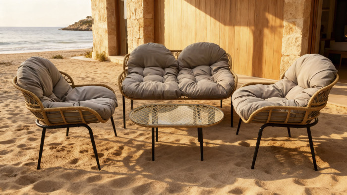 Set de jardí lounge 4 peces en ratan natural amb coixins encoixinats i taula central